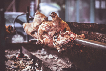 Roast lamb on a spit. Selective focus and small depth of fieldの写真素材