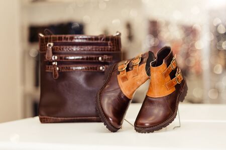 Fashionable Women Leather Shoes and bag on the shelf at the shoe store. Copy space.の写真素材