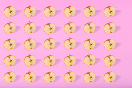 Trendy Summer pattern made with fresh banana fruit on bright light blue background. Minimal summer...