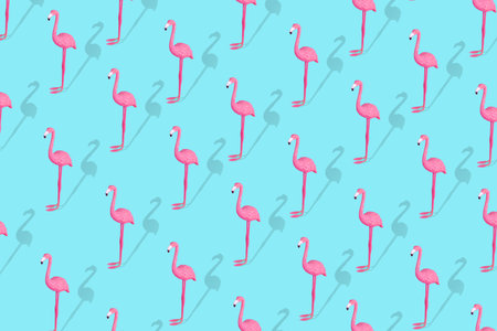 Trendy  Summer pattern made with pink flamingo on bright light blue background. Minimal creative and...