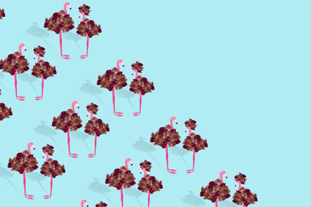 Creative fun concept with a stylized couple of flamingos on bright blue background. Pattern with exotic flamingo. Minimal spring or summer Holiday love concept. Free space for textの写真素材