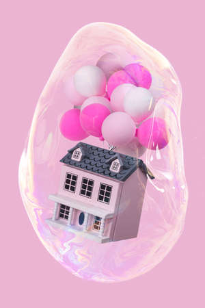 Creative idea with a house with a lot of colorful balloons in a soap bubble flying in the air. Minimal concept for advertising, marketing or artwork design.の写真素材