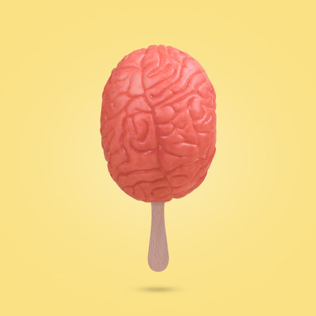 Creative funny  idea made from a stick of ice cream and the human brain on a yellow background....