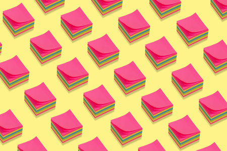 Colorful sticky notes pattern on a  yellow background. Creative minimal isometric concept. Back to...