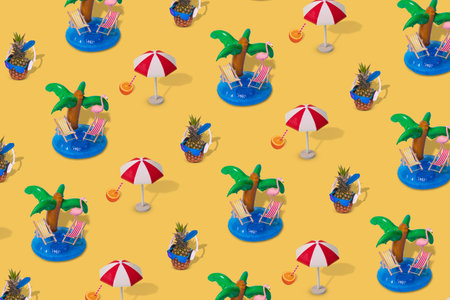 Trendy summer pattern made with various summer things on pastel yellow background. Minimal summer...