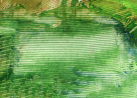 Vibrant colorful acrylic abstract painting with thick strokes and splashes of paint. Expressive green colors mixture. Hand painted arts backgroundの写真素材