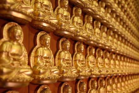 close up at buddhist on the wallの写真素材