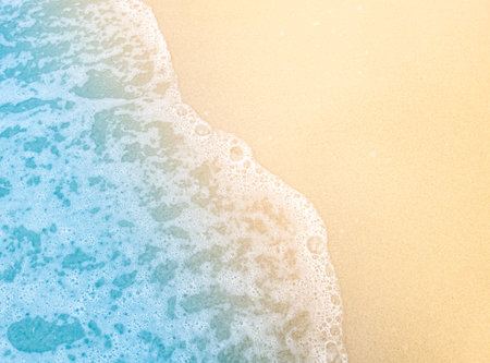 Wave bay beach with blue soft water, beautiful sandy beach and soft blue sea waves,blue sea water with brown sandy beach, Soft blue sea waves on a clean sandy becahの写真素材