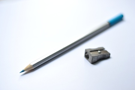 Pencil and sharpener isolated on white background の写真素材