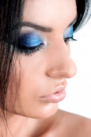 strong, beautiful woman with extreme make upの写真素材