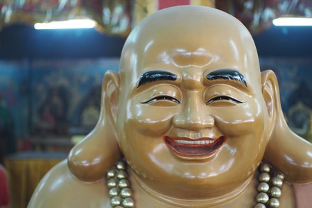 Chinese statue of good moodの写真素材