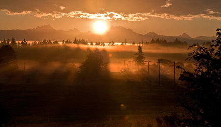stunning sunrise over the mountain known as 3 Sisters or 3 Fingers (called both commonly) in...
