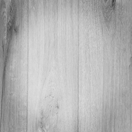 Wood texture black and white vignette in 12x12 for graphic design resource.  Wooden planks are light colored and run vertical lines in the wood grain.の写真素材