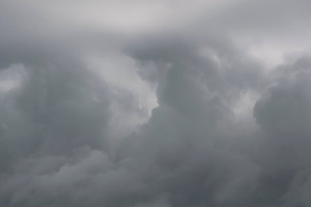 Stormy gray clouds in sky nature image of rainclouds.  Great for climate and weather or environment topics.の写真素材