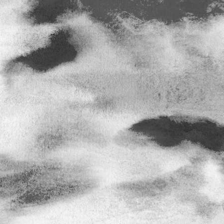 Abstract watercolor gray and white shades in this handpainted background paint texture design element.の写真素材