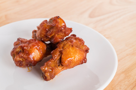 grill chickens wing in white plateの写真素材