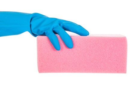 Hand in blue glove with pink sponge isolated on white backgroundの写真素材