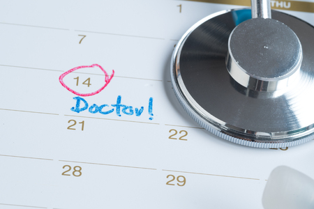 doctor day plan marked on calendarの写真素材