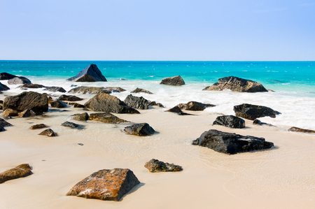 turquoise sea white sand and rocky under sunshine very beautiful nature at Bai nhat beach Condao island - Vietnam.の写真素材