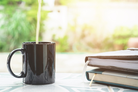 Milk cup and book in Morningの写真素材