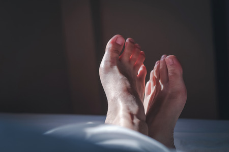 Morning Step Female Foot Sleep Relax Conceptの写真素材