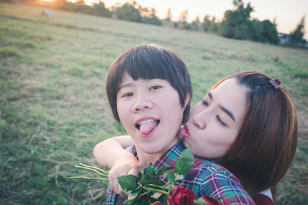 Smiling couple in love outdoors Lifestyle concept. Couple of young attractive touristsの写真素材