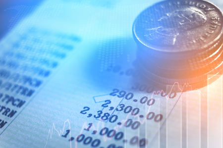 graph on rows of coins for finance and banking conceptの写真素材