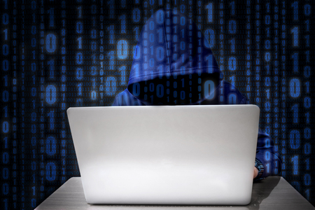 Hacker using keyboard typing bad data into computer online system and spreading to global stolen personal information. Cyber security conceptの写真素材