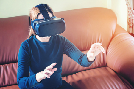 Woman wearing virtual reality glassesの写真素材