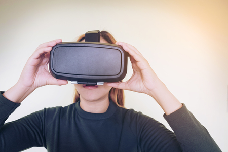 Woman wearing virtual reality glassesの写真素材