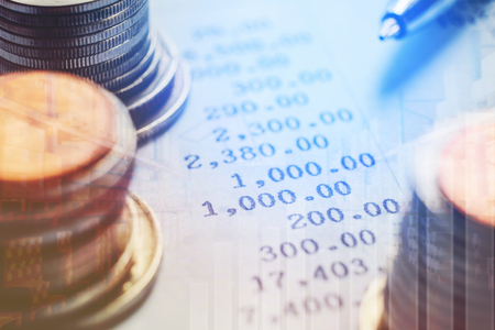 Graph on rows of coins for finance and banking on the business paper. Report chartの写真素材