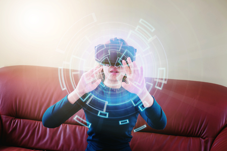 Woman Using 3-D glasses  in virtual reality glasses or headsetの写真素材