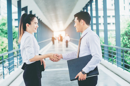 Business partnership handshaking after striking deal outdoors at meeting  outdoor conceptの写真素材