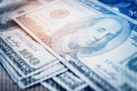 Dollar bills finance and banking on digital stock market financial exchange and Trading graphの写真素材