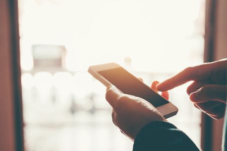 Man Typing Phone Message On Social Networkの写真素材