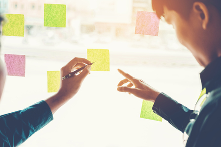 Team creative business planning and thinking of ideas for success work projectの写真素材