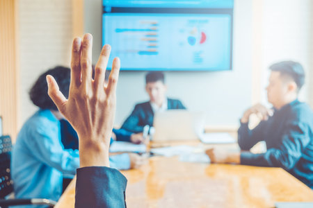 Business women raised hand business seminar , business meeting conceptの写真素材