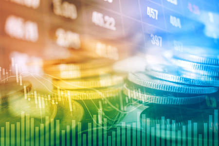 Graph on rows of coins for finance and banking on digital stock market financial exchange and Trading graphの写真素材