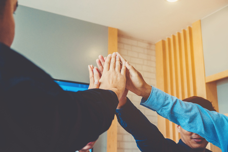 Business Teamwork joining hands team spirit Collaboration Conceptの写真素材