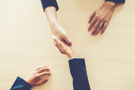 Business people colleagues shaking hands meeting Planning Strategy Analysis Conceptの写真素材