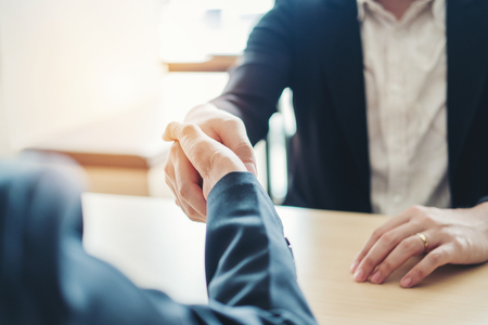 Business people colleagues shaking hands meeting Planning Strategy Analysis Conceptの写真素材