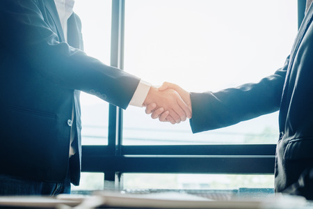 Business people colleagues shaking hands meeting Planning Strategy Analysis Conceptの写真素材