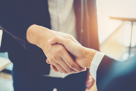 Business people colleagues shaking hands meeting Planning Strategy Analysis Conceptの写真素材