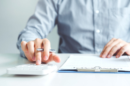 Business man Accounting Calculating Cost Economicの写真素材