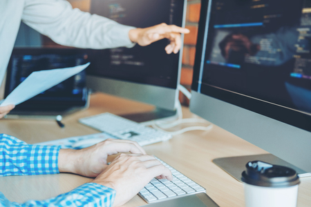 Developing programmer Team Development Website design and coding technologies working in software company officeの写真素材