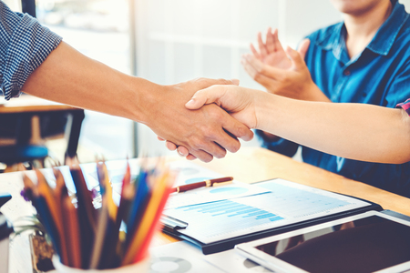 Business people colleagues shaking hands meeting Planning Strategy Analysis Conceptの写真素材