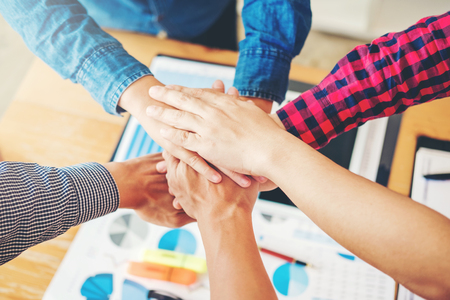 Business Teamwork joining hands team spirit Collaboration Conceptの写真素材