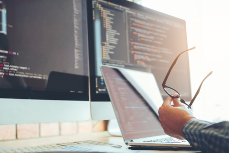 Developing programmer Development Website design and coding technologies working in software company officeの写真素材