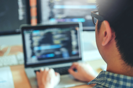 Developing programmer Development Website design and coding technologies working in software company officeの写真素材