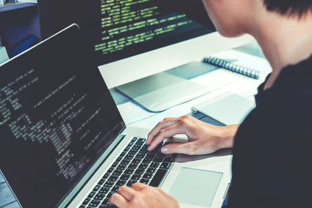 Developing programmer Development Website design and coding technologies working in software company officeの写真素材